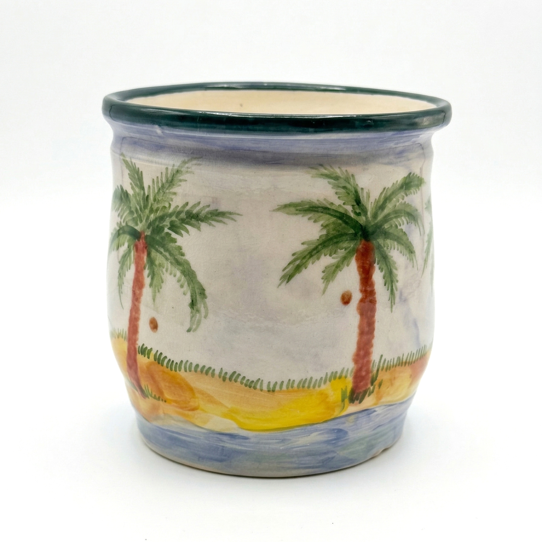 Handmade planter with palm trees and beach scene